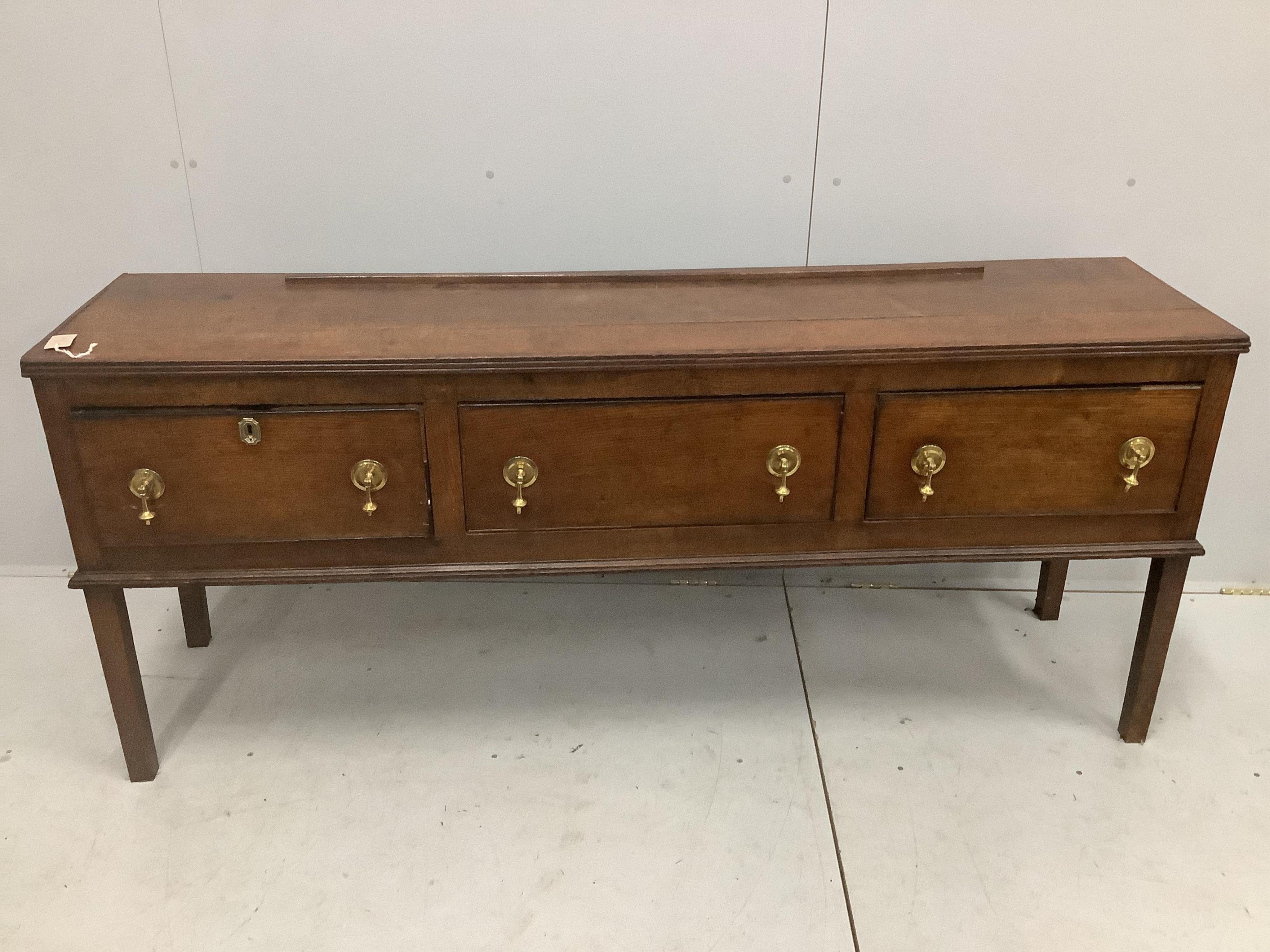 A George III mahogany banded oak dresser with boarded rack, width 182cm, depth 45cm, height 204cm. Condition - fair